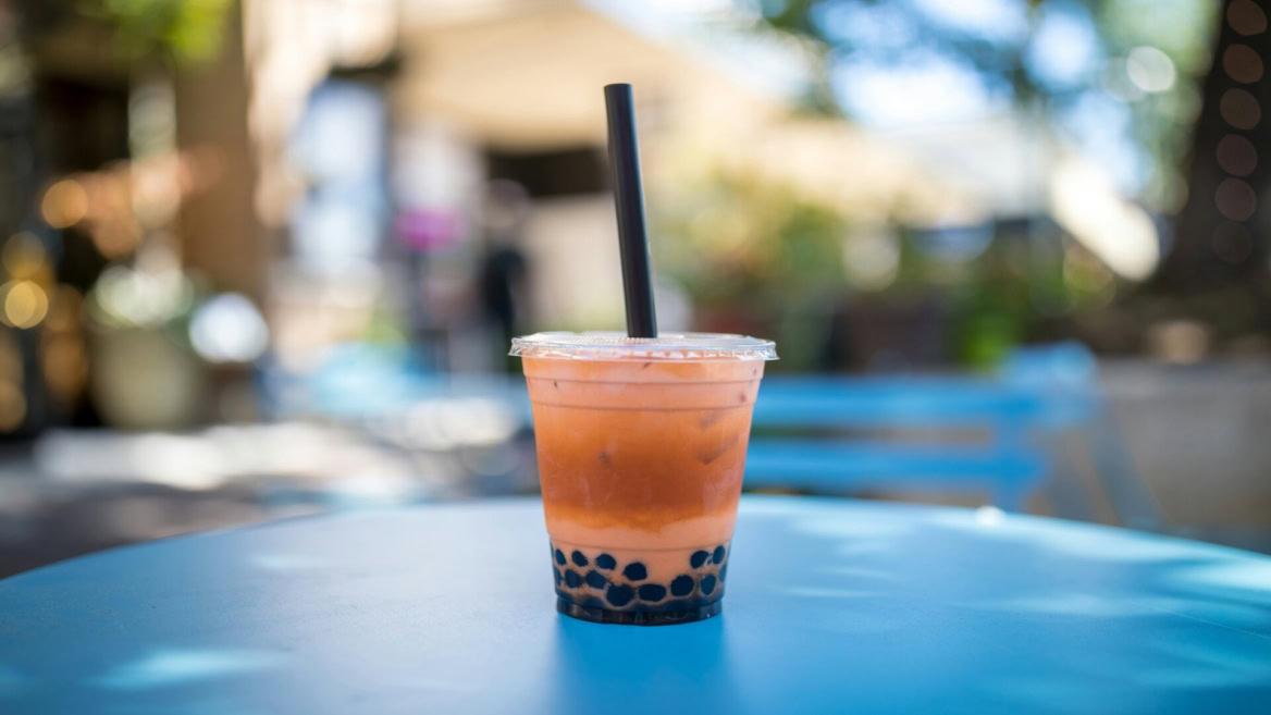bubble tea on blue outdoor table