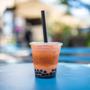 bubble tea on blue outdoor table