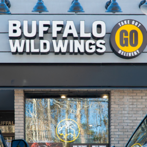 buffalo wild wings storefront with takeout delivery signage