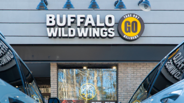 buffalo wild wings storefront with takeout delivery signage