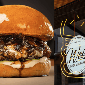 burger gourmet y letrero neón de meat beer & burgers