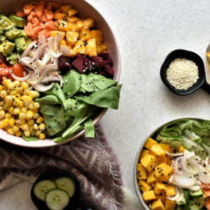 colorful salad bowls with sesame and dressing