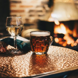 warm drinks by the fireplace