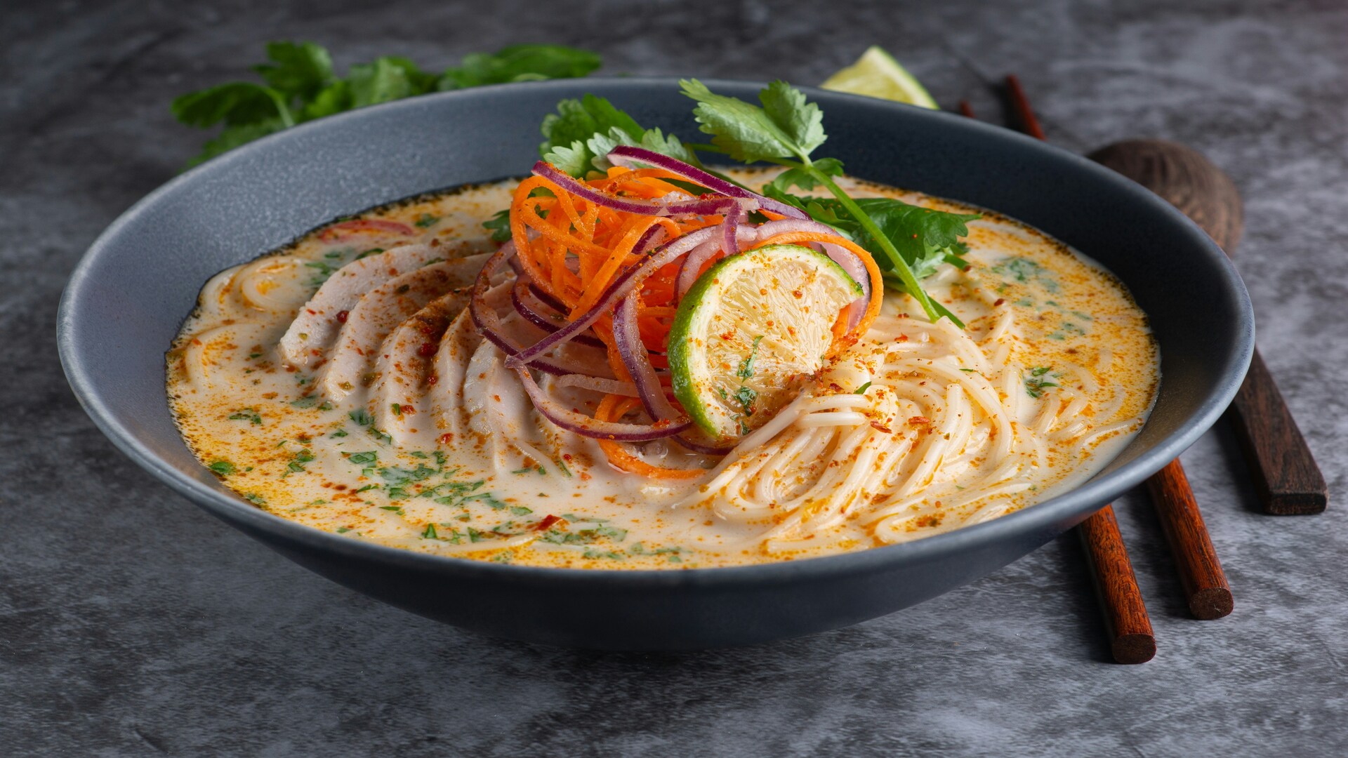 creamy chicken noodle soup with lime and herbs