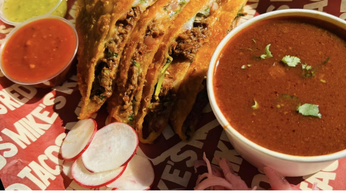 indian fried snacks with curry and chutneys