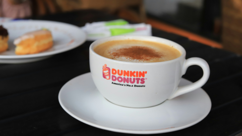 dunkin’ donuts cappuccino cup with pastries