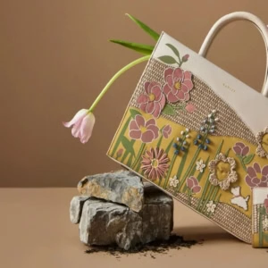 floral handbag and wallet still life