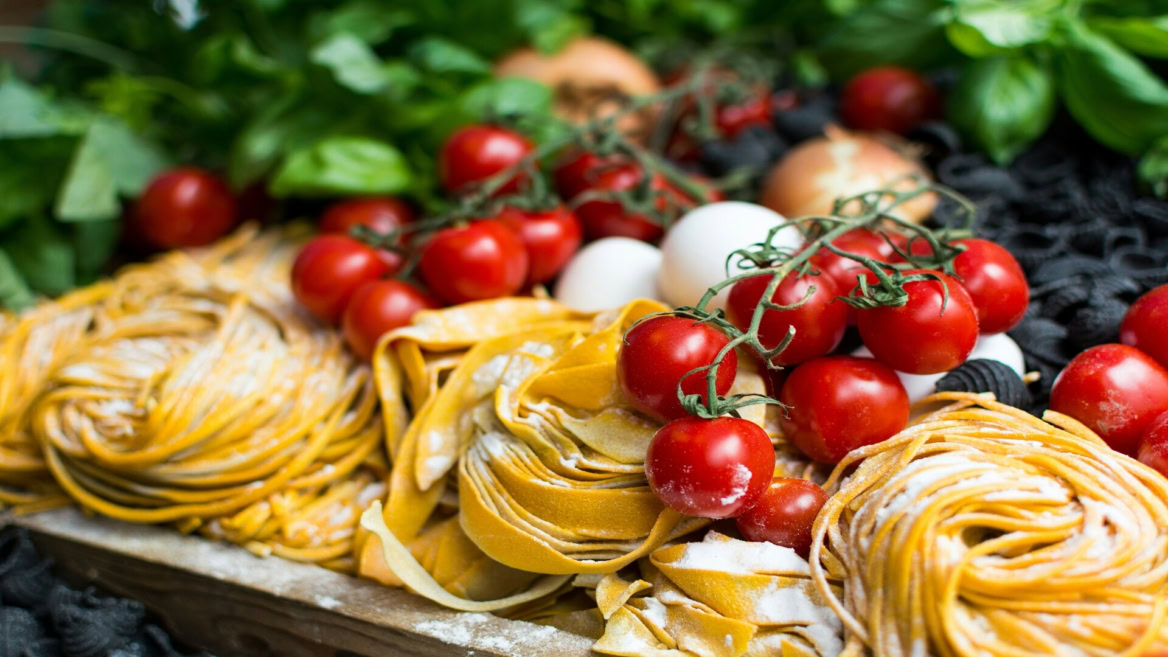 fresh pasta nests with cherry tomatoes