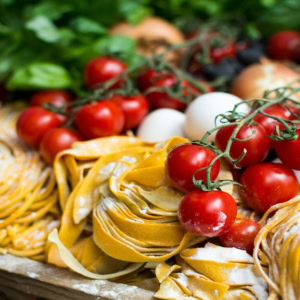 fresh pasta nests with cherry tomatoes