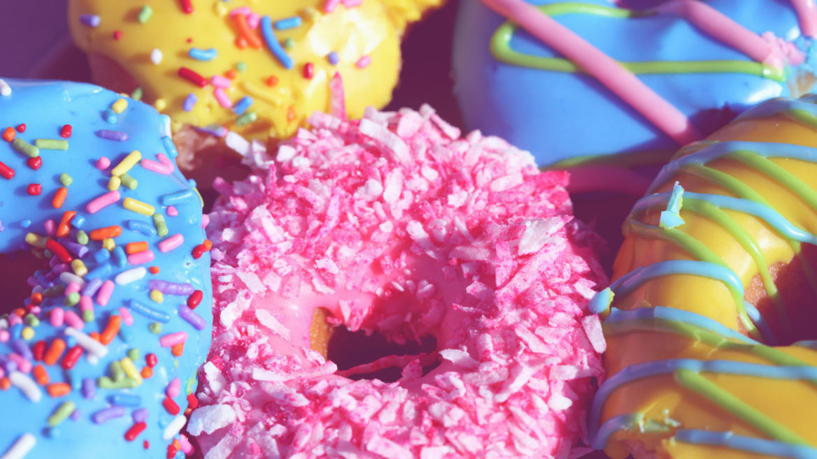 colorful frosted donuts close up macro shot
