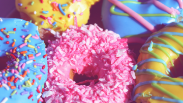colorful frosted donuts close up macro shot