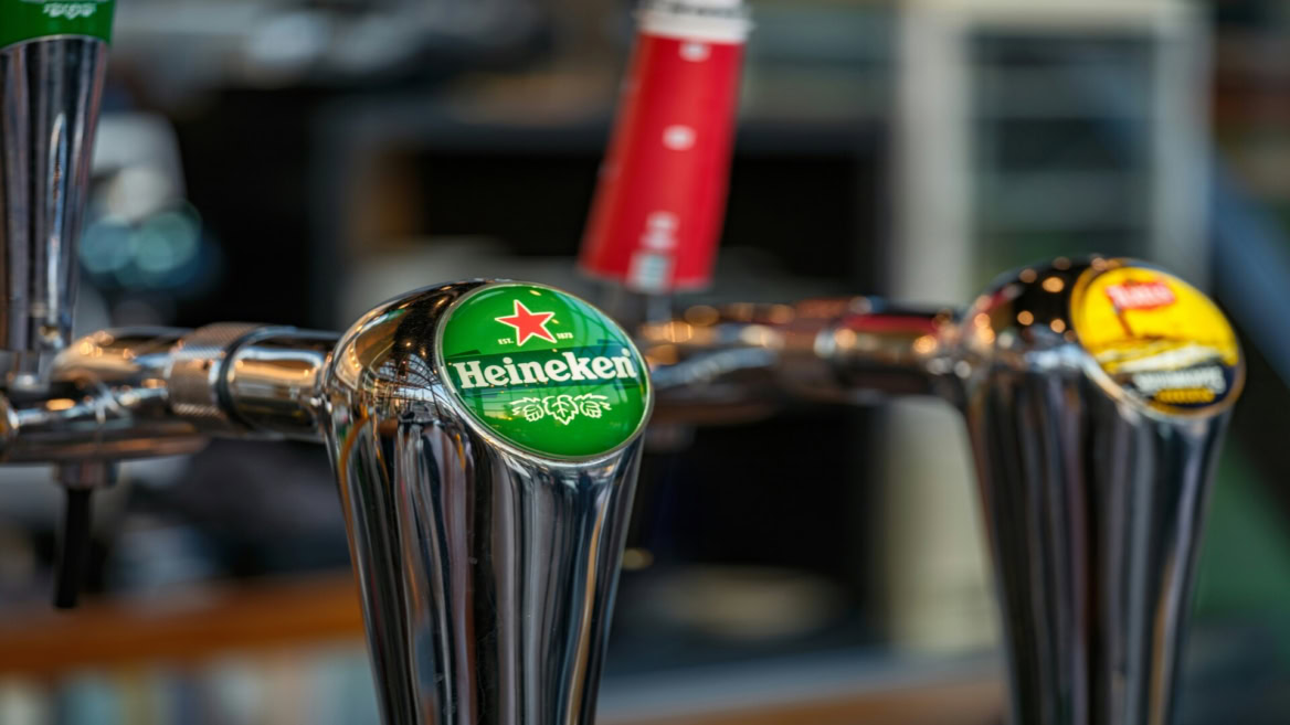 heineken beer tap close up at the bar