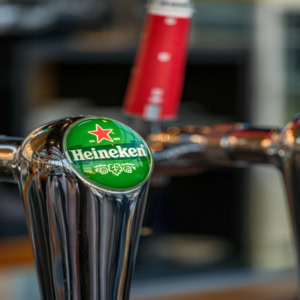 heineken beer tap close up at the bar