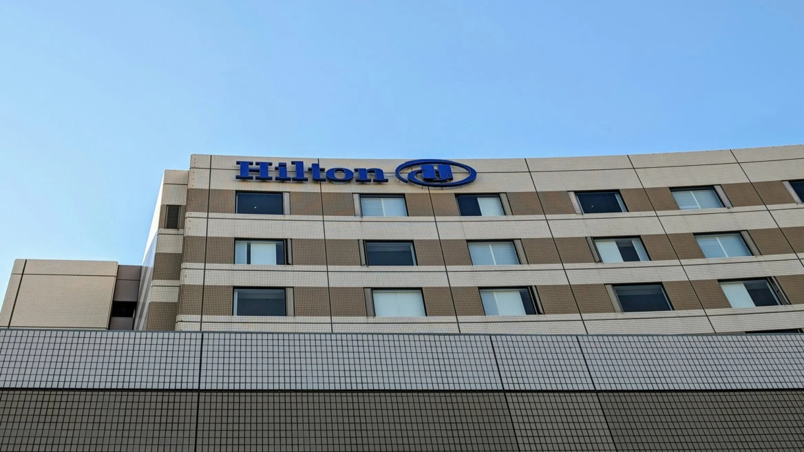 hilton hotel facade with blue logo