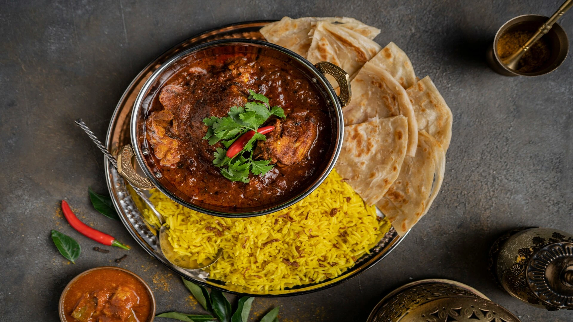 indian curry, saffron rice and naan feast