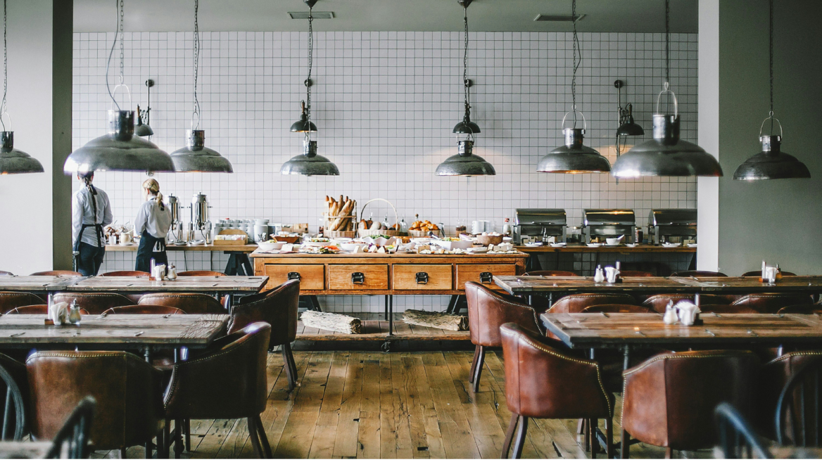 industrial restaurant buffet with wooden tables