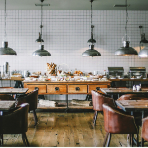 industrial restaurant buffet with wooden tables