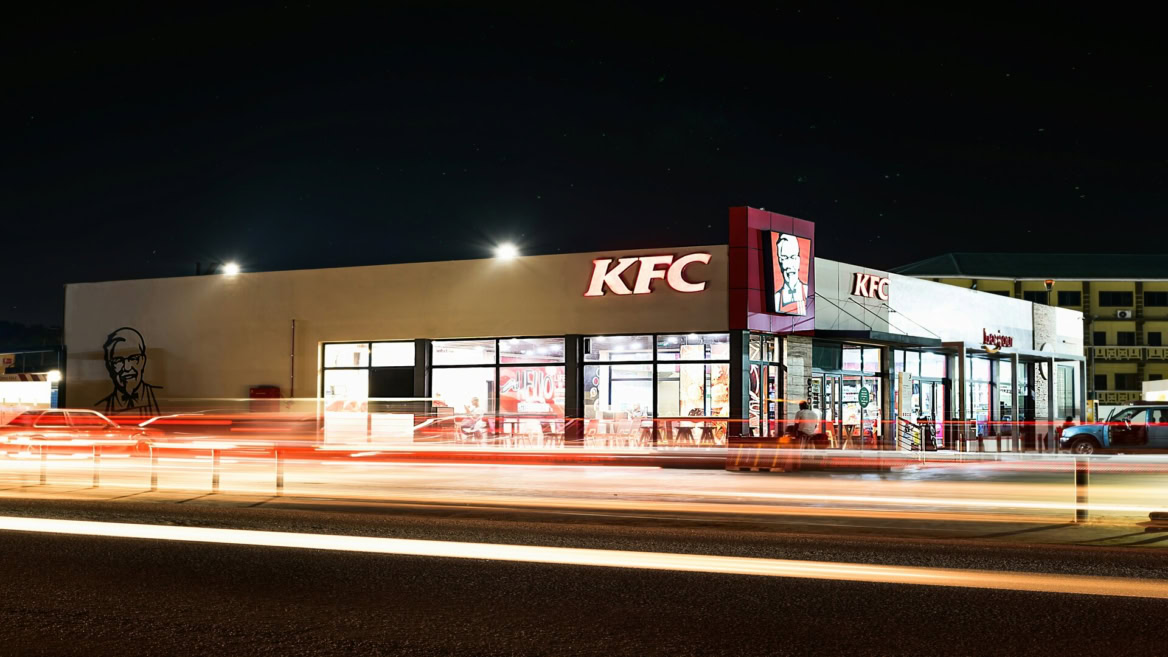 kfc restaurant by night with light trails