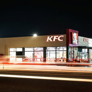 kfc restaurant by night with light trails