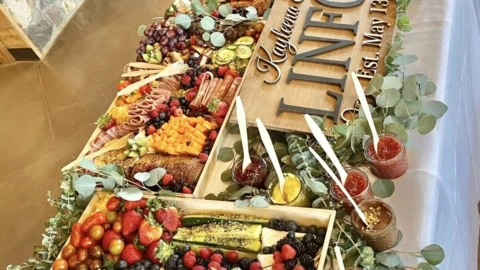 luxury wedding grazing table with charcuterie and fruit