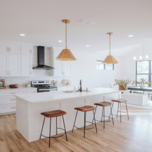 modern white kitchen with dining area