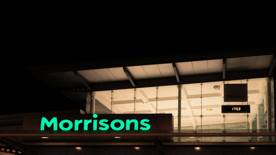 morrisons supermarket at night, illuminated sign
