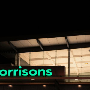 morrisons supermarket at night, illuminated sign
