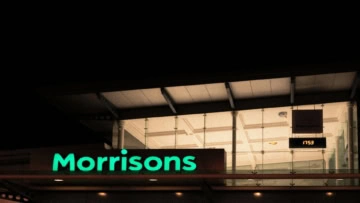 morrisons supermarket at night, illuminated sign