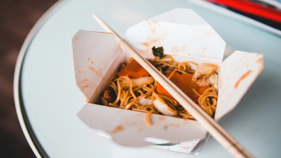 noodle takeaway box with chopsticks