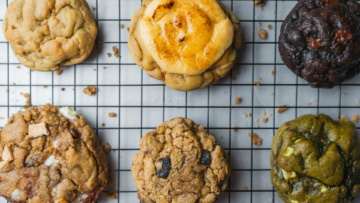 assorted gourmet cookies on cooling rack