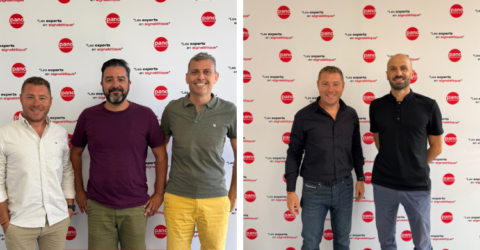 groupes d’entreprise devant mur de logos￼