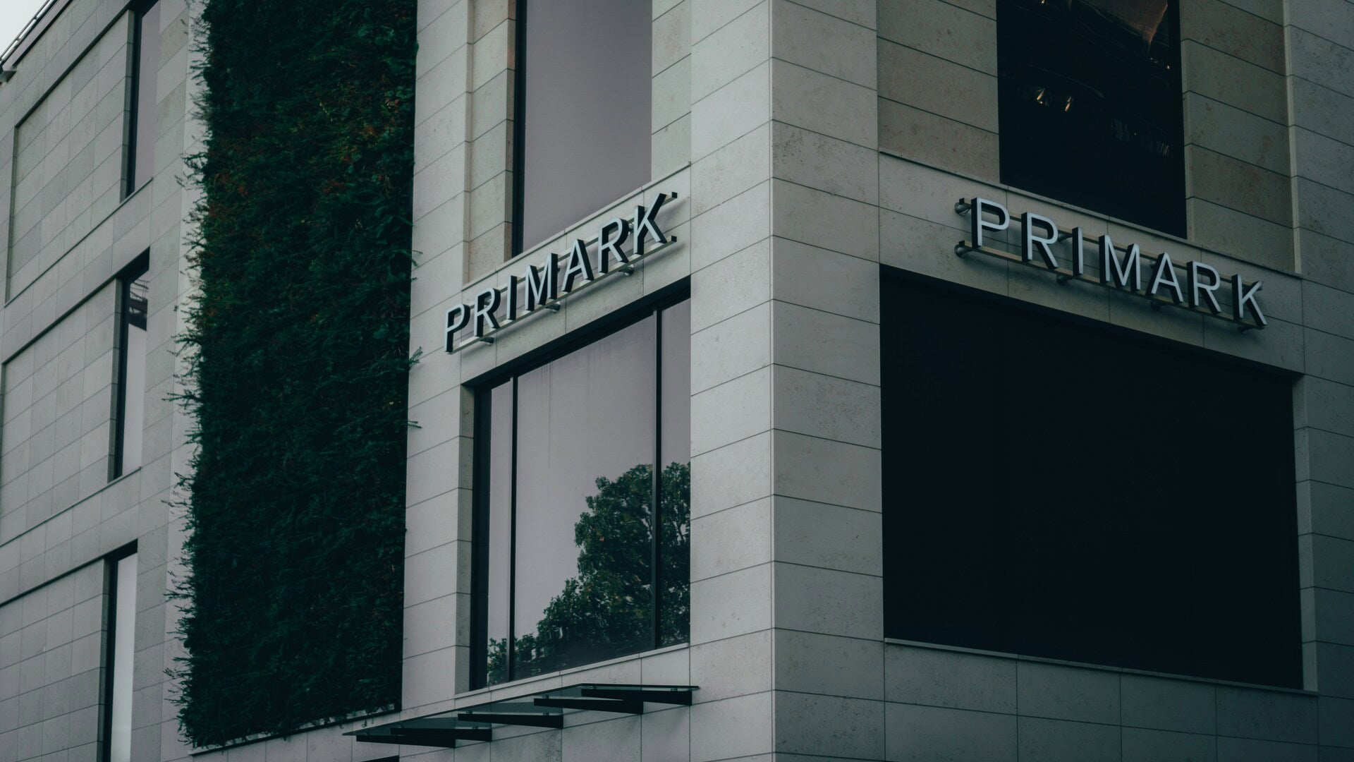 primark storefront on modern green facade