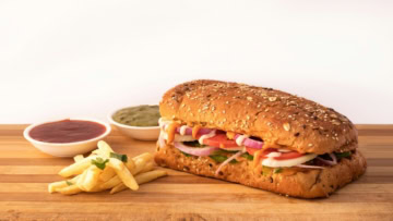 seeded sandwich, fries and dipping sauces
