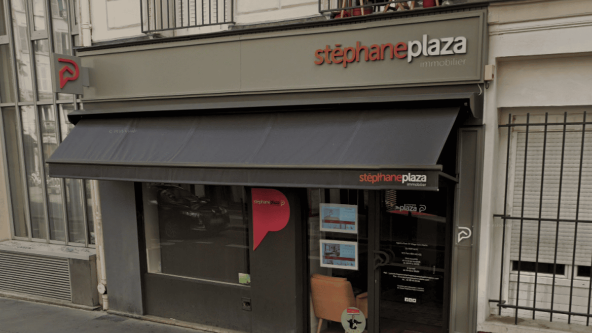 façade d’agence immobilière stéphane plaza en ville