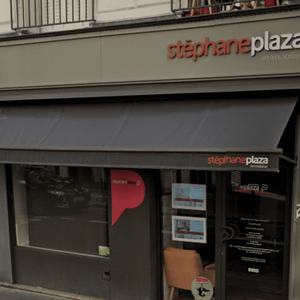 façade d’agence immobilière stéphane plaza en ville