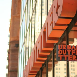 urban outfitters storefront with orange city signage