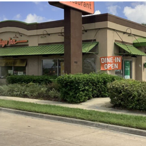 village inn restaurant exterior with green awning