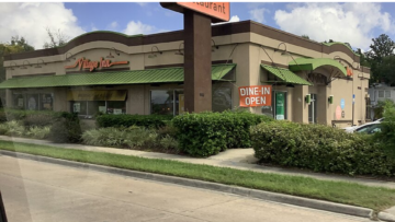 village inn restaurant exterior with green awning