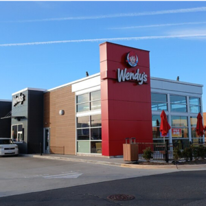 modern wendys restaurant with patio and parking lot
