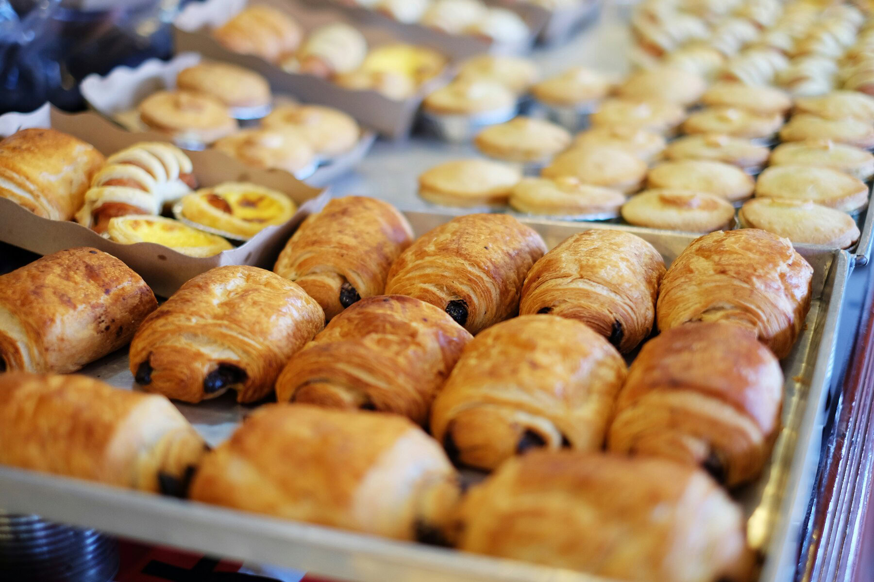 bakery display of fresh pastries and chocolate croissants