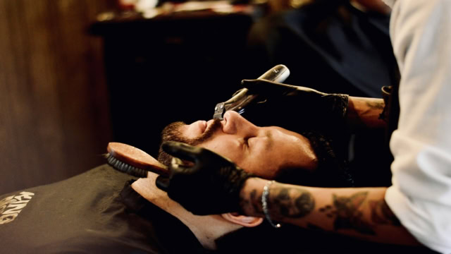 traditional straight razor shave in barber shop