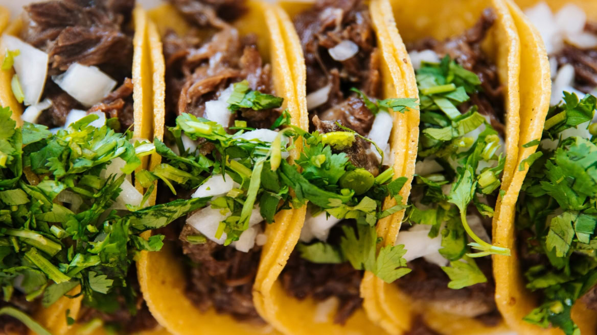 beef tacos with cilantro and onion