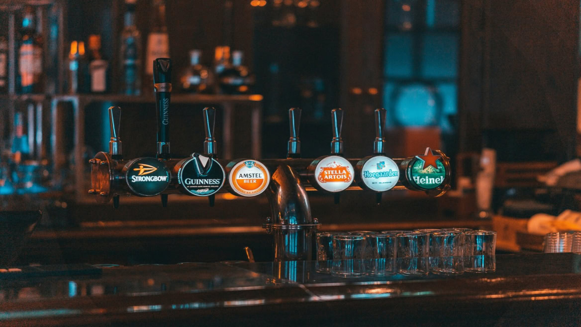 branded beer taps in stylish pub bar