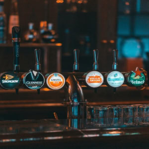 branded beer taps in stylish pub bar