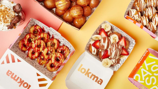 boîtes de donuts gourmands sur fond pastel