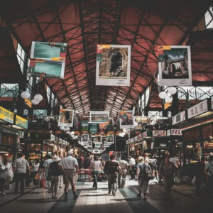 bustling malta market hall under dramatic roof