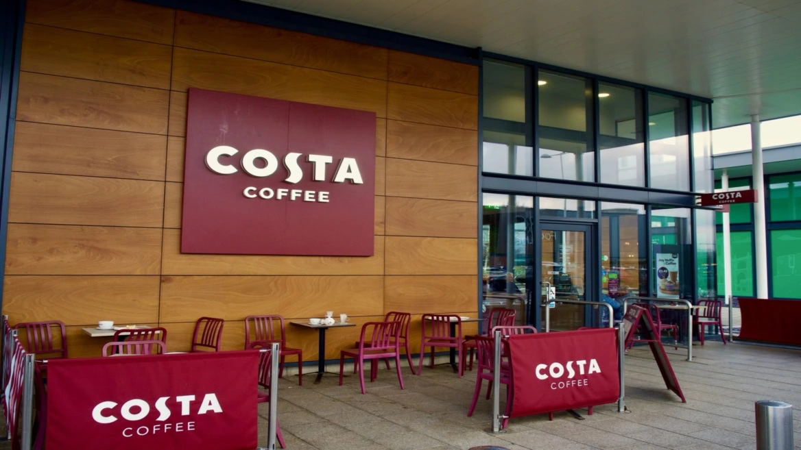 costa coffee storefront with outdoor seating
