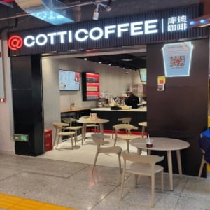 cotti coffee kiosk in a bright indoor mall