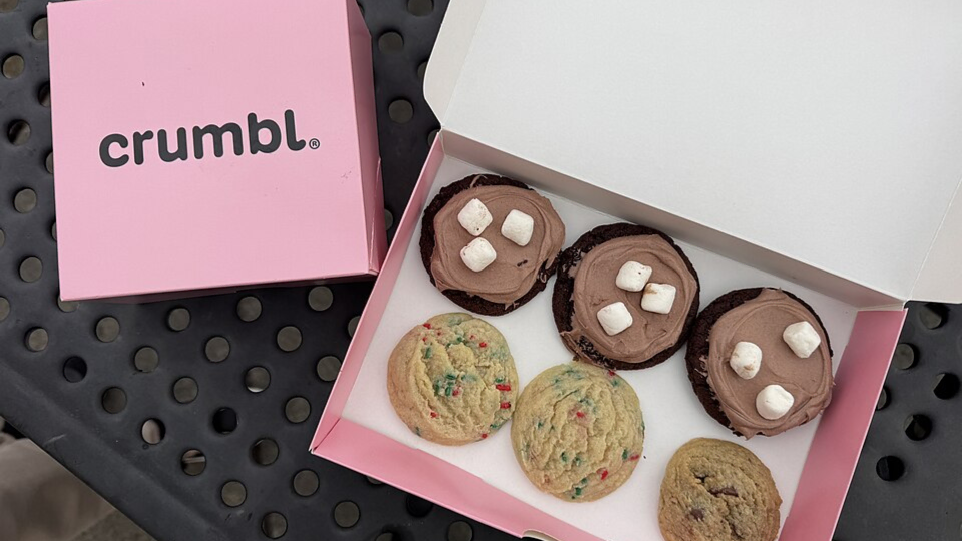 crumbl cookie box with assorted cookies