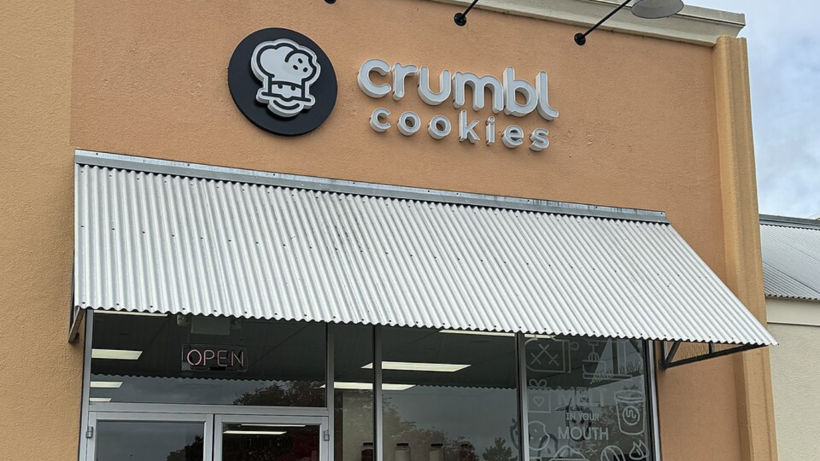 crumbl cookies storefront with open sign